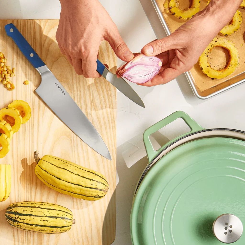 Weighted metal ladle scratch testing on Misen pan